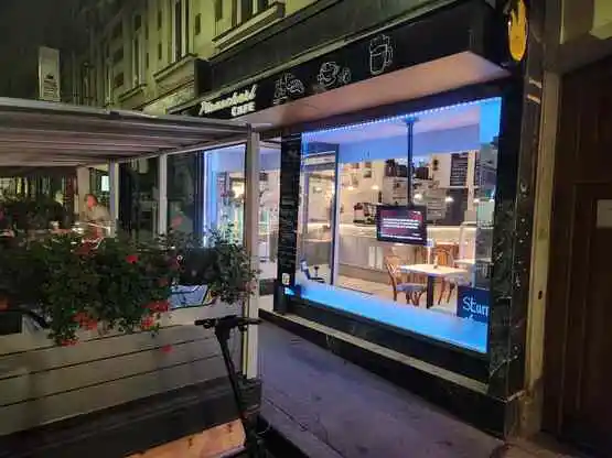 Outside view of our cafe with the sidewalk garden